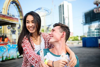 Invisalign Patient in Portage smiling on a date