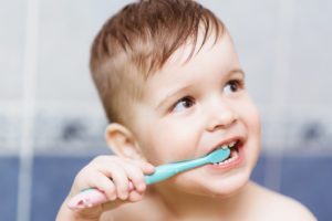 Boy brushing his teeth